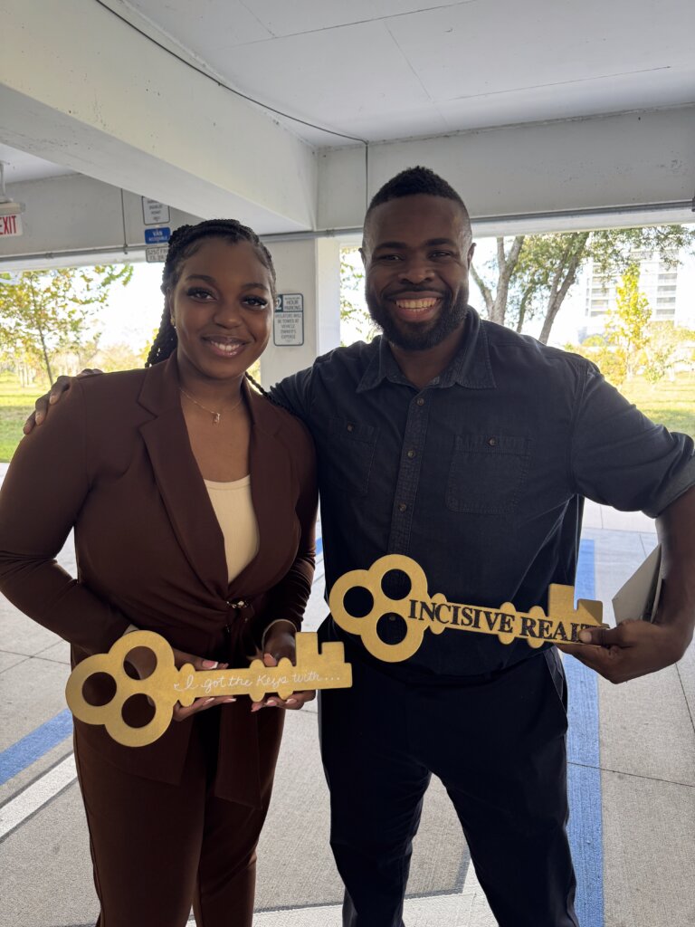 New homeowners with their keys
